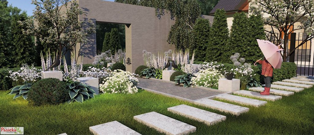 Elegancka rabata miododajna z roślin biało kwitnących w pobliżu ogrodowego lustra