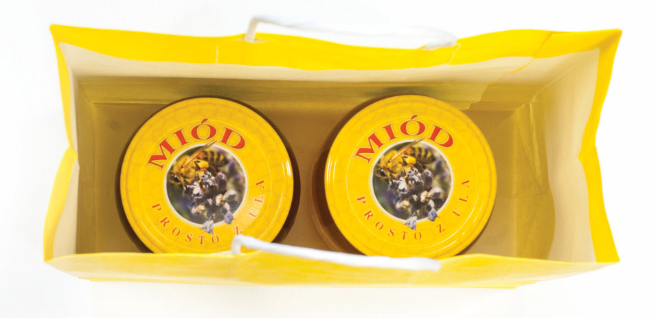 Obraz zawierający żółty, koło